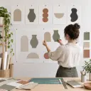 Designer comparing AI clipart generator shapes for a template layout