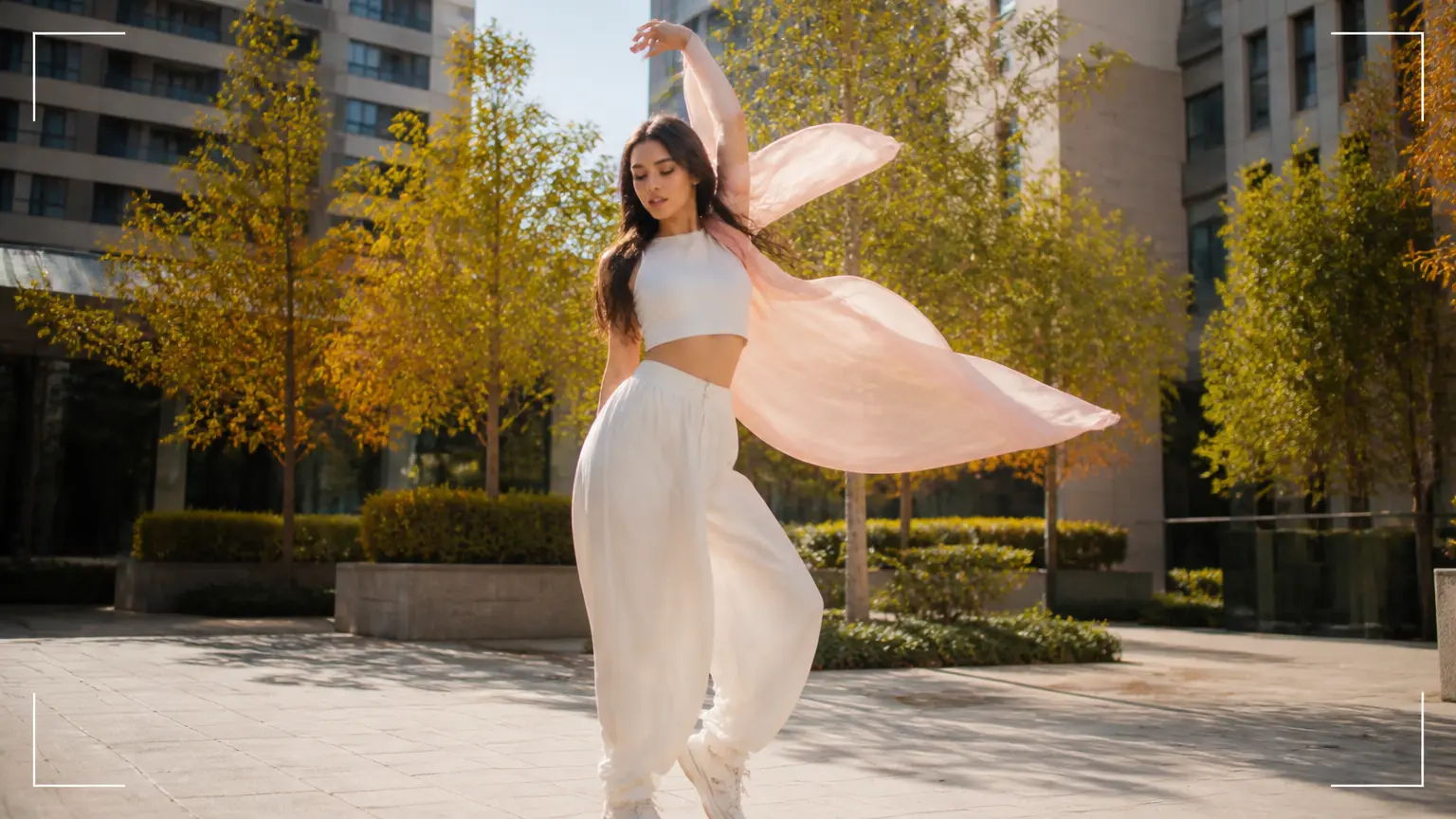Dancer performing a dynamic vertical social video in daylight