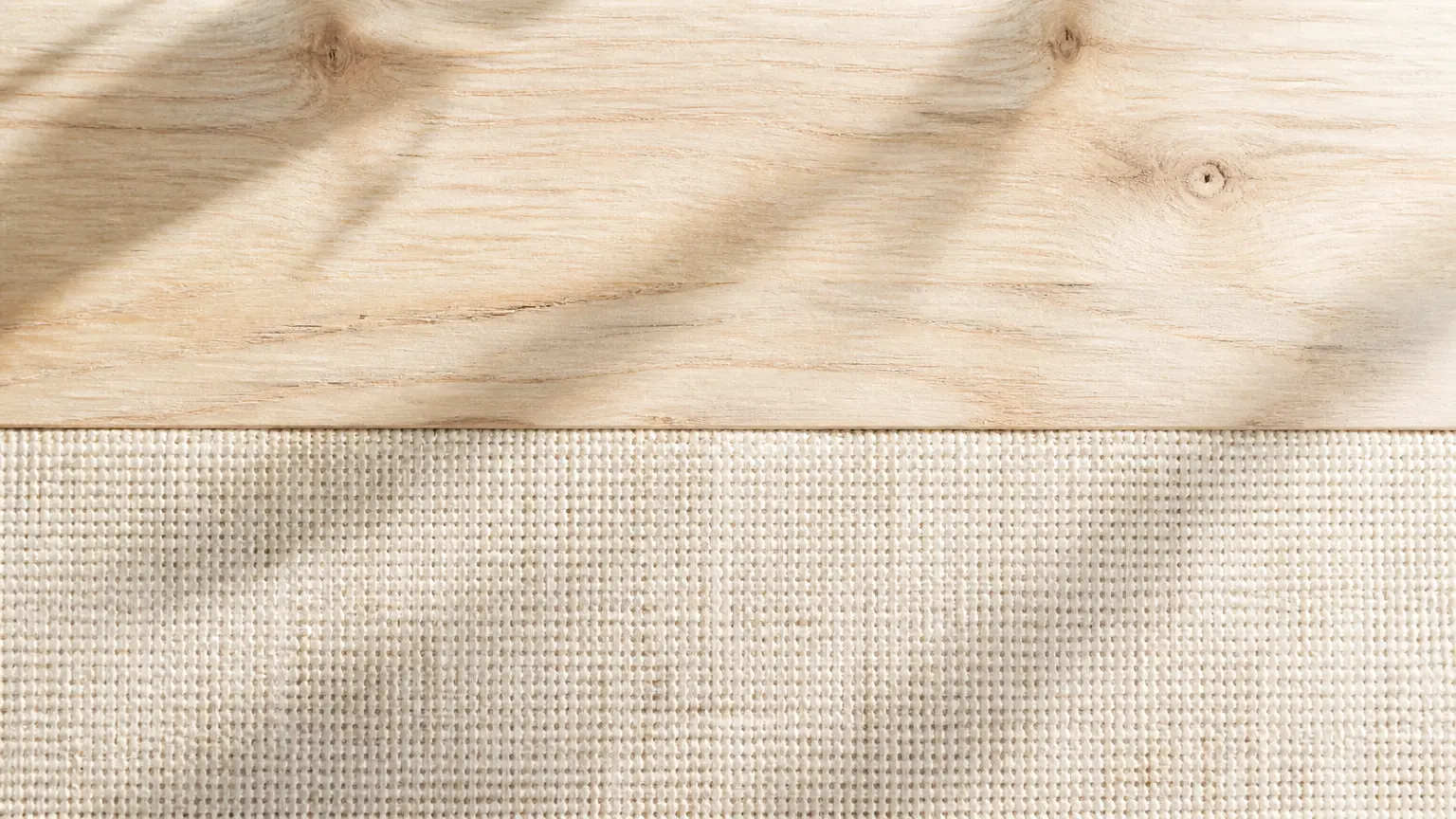 Wood grain and fabric texture continuing naturally after text removal