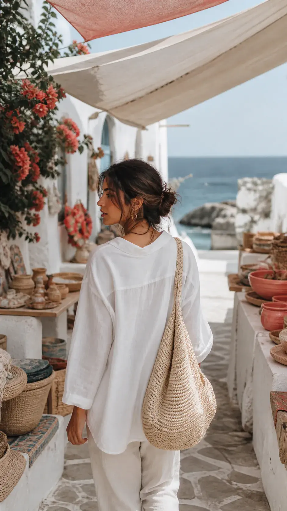 Vertical video still of a travel creator walking through a sunlit coastal market with natural motion