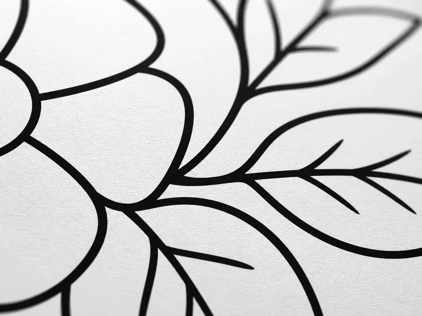 Close up of solid black closed outlines on pure white paper with no grey shading anywhere
